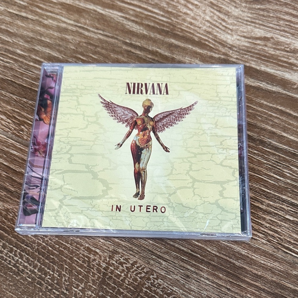 NIRVANA 'In Utero' Album with Cream and Red Cover CD. New with plastic cover